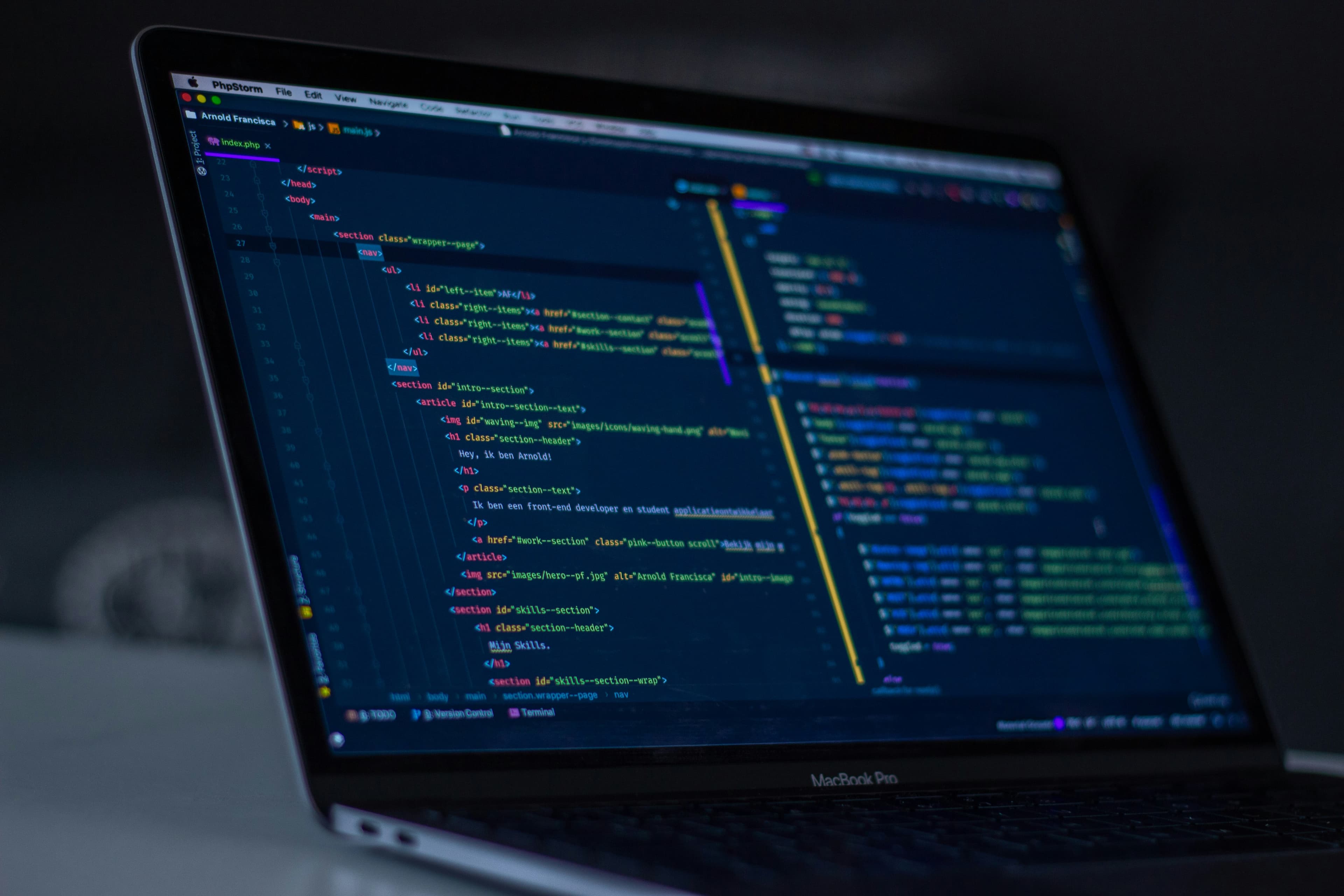Laptop screen showing application source code